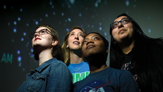 students in NDMU planetarium